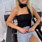 Elena - Top asimétrico con flor