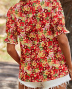 Flavia - Blusa floral con mangas abullonadas