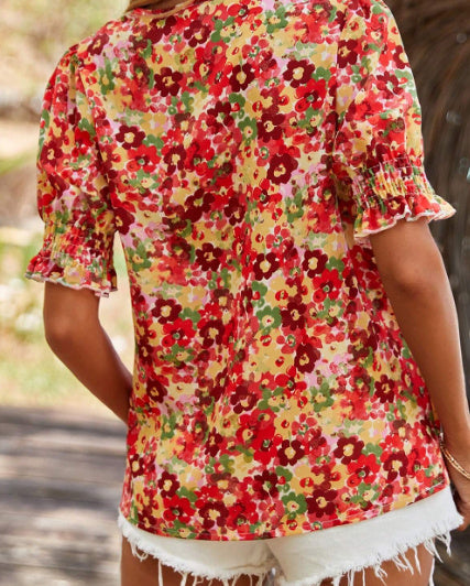 Flavia - Blusa floral con mangas abullonadas
