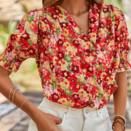 Flavia - Blusa floral con mangas abullonadas