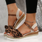 Reina - Sandalias de cuña con alpargata anudada