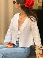 Carmen | Elegante blusa larga con lazo
