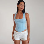 Lía - Blusa azul sin mangas con encaje