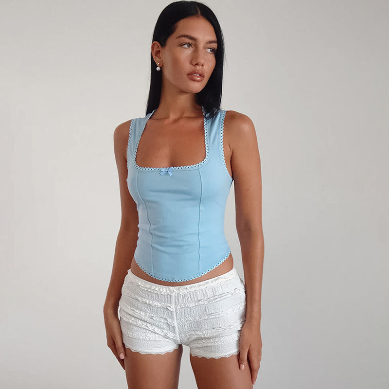 Lía - Blusa azul sin mangas con encaje